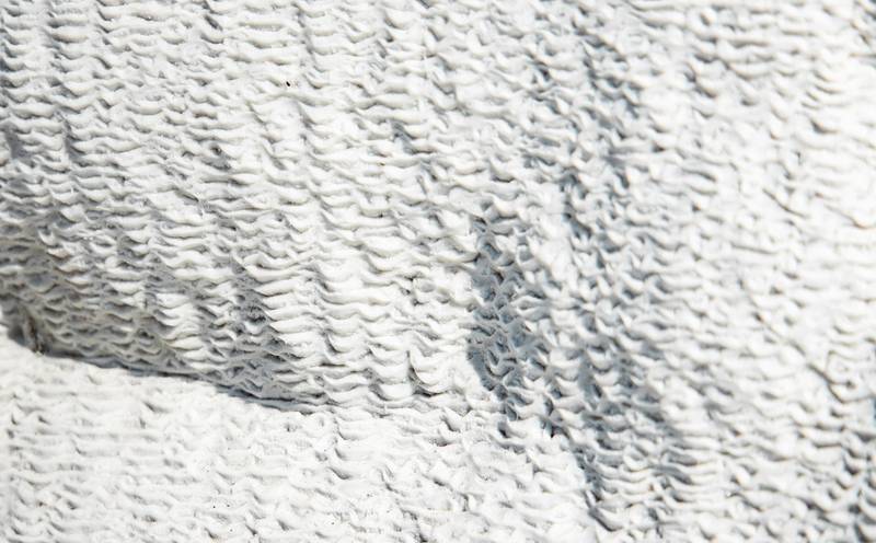 A white sculpted surface